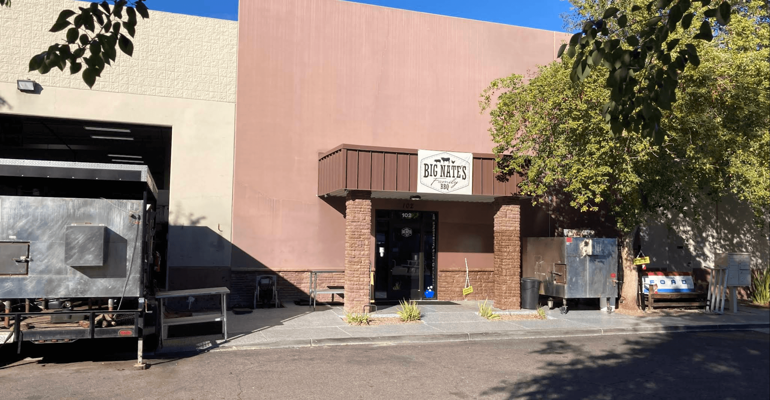 Big Nate's Family BBQ storefront in Mesa, with smokers outside the entrance